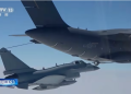 In this image taken from video footage run Saturday by China's CCTV, a Chinese fighter jet performs a mid-air-refuelling manoeuvre at an unspecified location. The Chinese military announced exercises around Taiwan on Saturday in a new act of retaliation for a meeting between the U.S. House of Representatives Speaker and the president of the self-ruled island democracy. (CCTV/The Associated Press)
