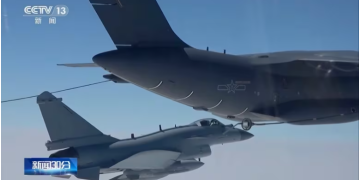 In this image taken from video footage run Saturday by China's CCTV, a Chinese fighter jet performs a mid-air-refuelling manoeuvre at an unspecified location. The Chinese military announced exercises around Taiwan on Saturday in a new act of retaliation for a meeting between the U.S. House of Representatives Speaker and the president of the self-ruled island democracy. (CCTV/The Associated Press)