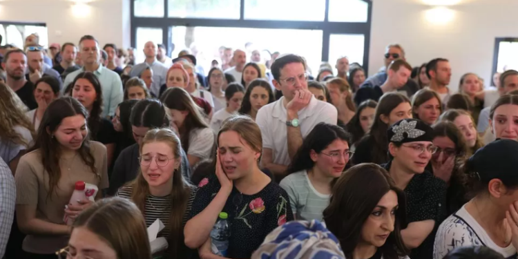 The funeral of the two sisters is taking place in the Israeli settlement of Kfar Etzion in the West Bank