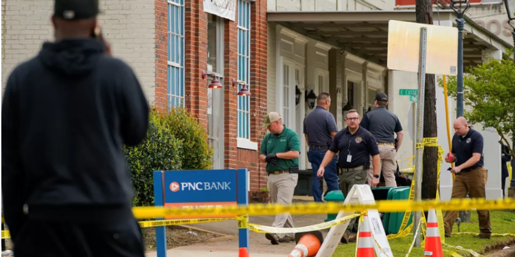 Law enforcement officers at the scene of the shooting in Dadeville, Alabama