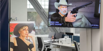 An animation depicts Mr Baldwin holding the gun that killed Ms Hutchins (left)