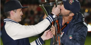 Wrexham's actor owners Ryan Reynolds and Rob McElhenney celebrate the club's Hollywood ending