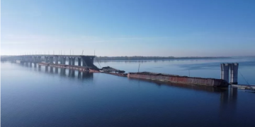 Russian troops destroyed the key Antonivskyi bridge over the Dnipro River when they were forced to withdraw last November
