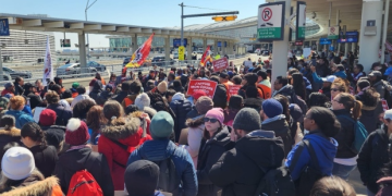 Protesters are seen at Toronto Pearson on April 27. (Lino Vieira PSAC)