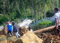 Race to rescue villagers trapped after landslide