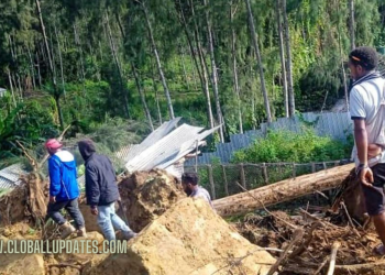 Race to rescue villagers trapped after landslide
