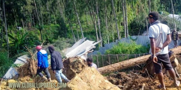 Race to rescue villagers trapped after landslide